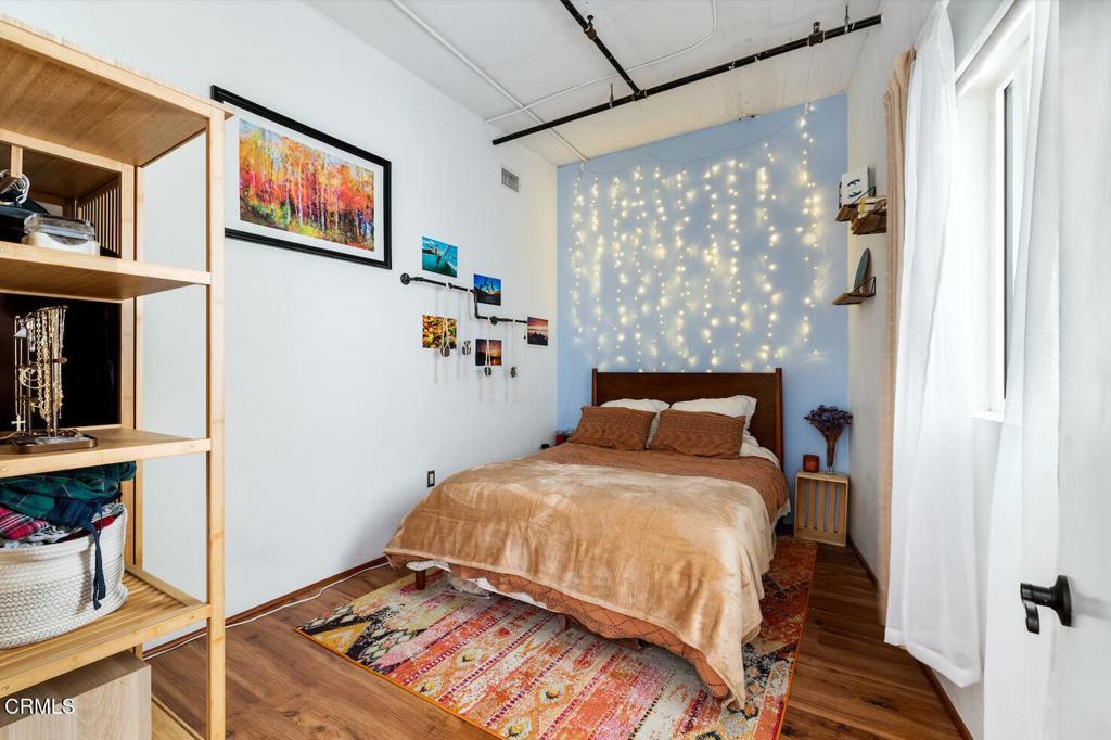200 North San Fernando Road, Unit 416 Los Angeles, CA 90031 - Photo 12 of 21 a bedroom with a bed and a window
