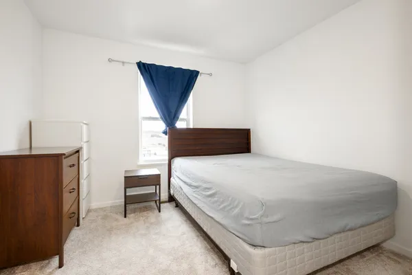 a view of bedroom and bathroom