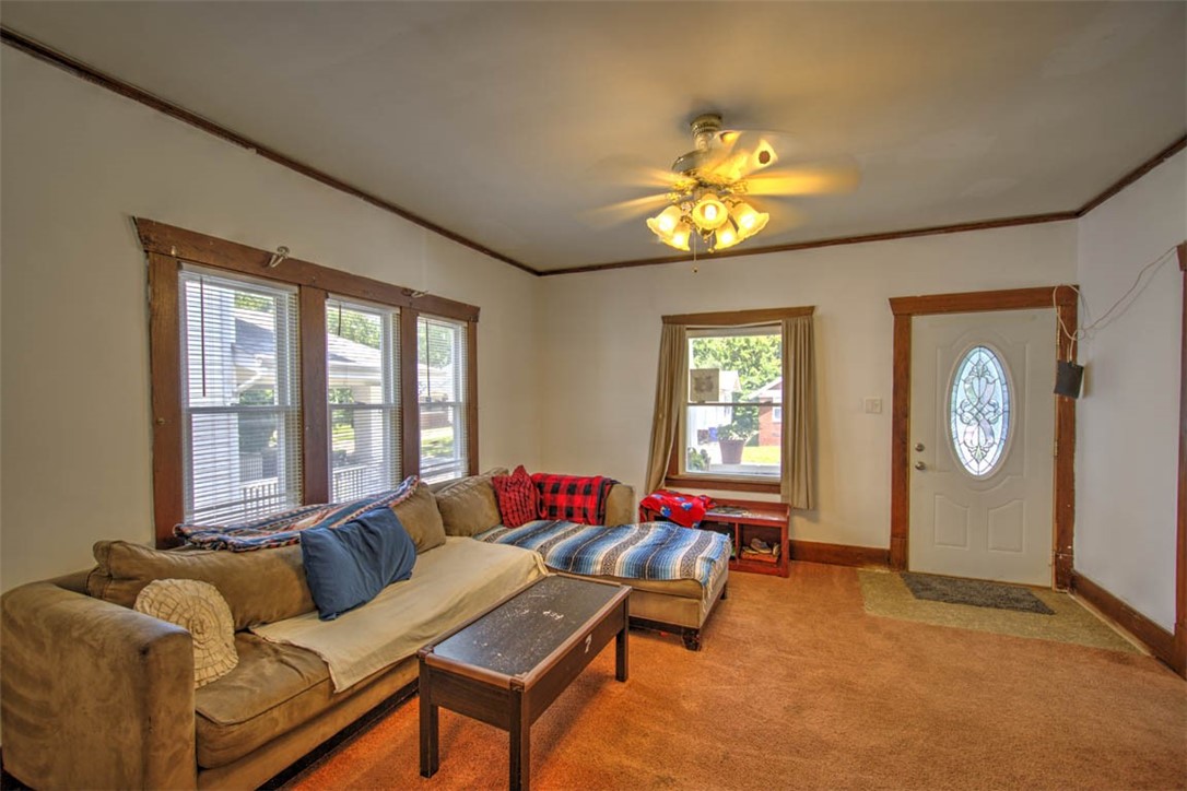 739 West Cushing Street Decatur, IL 62526 - Photo 8 of 28 a living room with furniture and a large window