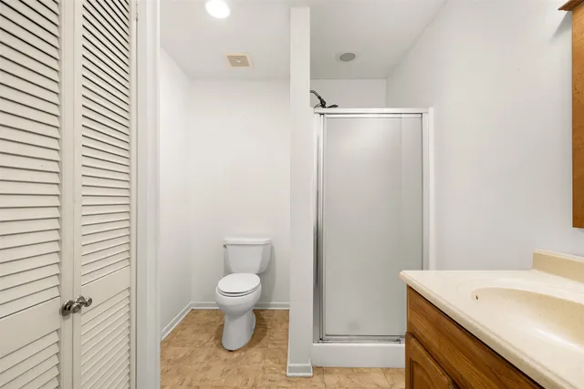 a view of a hallway with closet