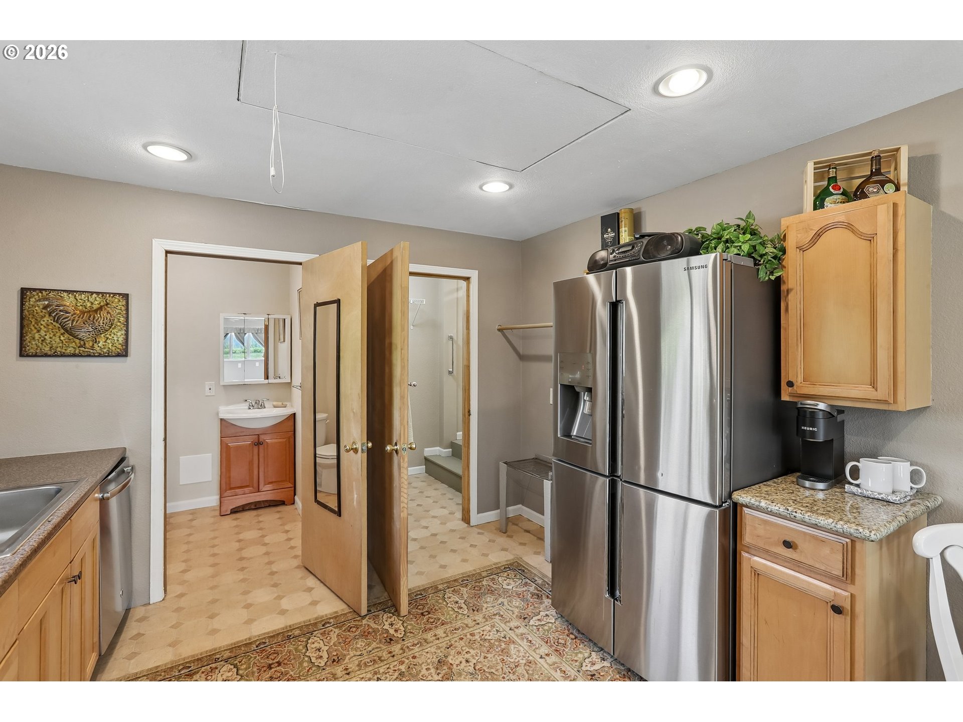298 Roberson Road Woodland, WA 98674 - Photo 43 of 48 a kitchen with stainless steel appliances granite countertop a refrigerator and a sink
