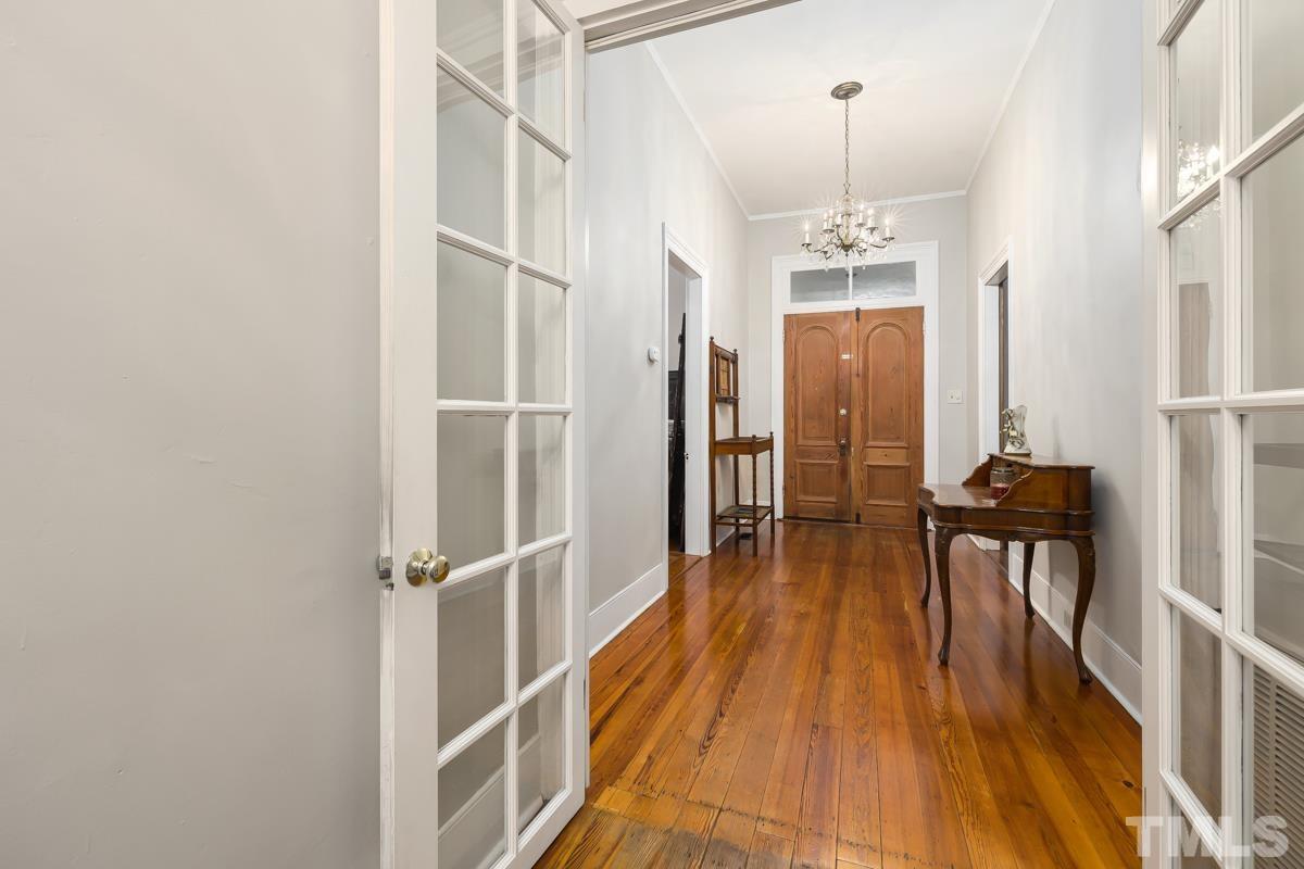 515 Polk Street Raleigh, NC 27604 - Photo 5 of 25 a view of a room with wooden floor and staircase