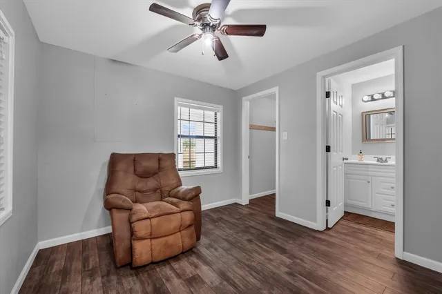 a kitchen with a refrigerator and a stove