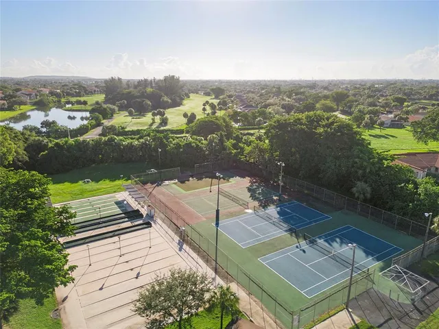 a view of a terrace with wooden floor and mountain view