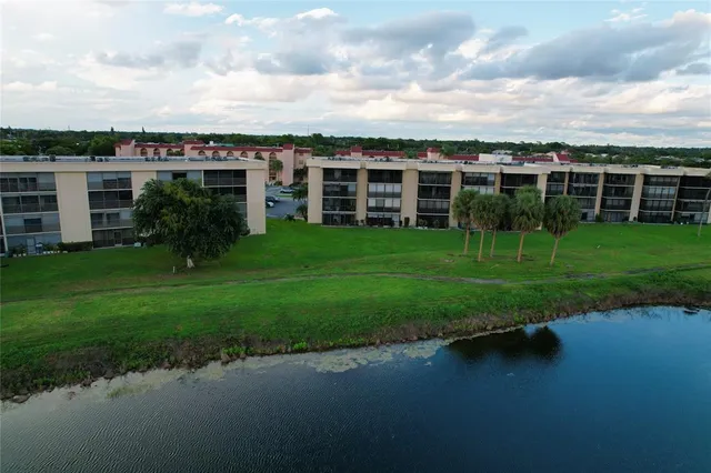 a view of a garden with a house