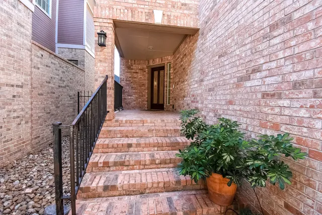 a view of entryway with a wooden door