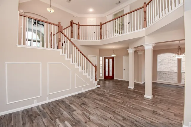a view of entryway with wooden floor