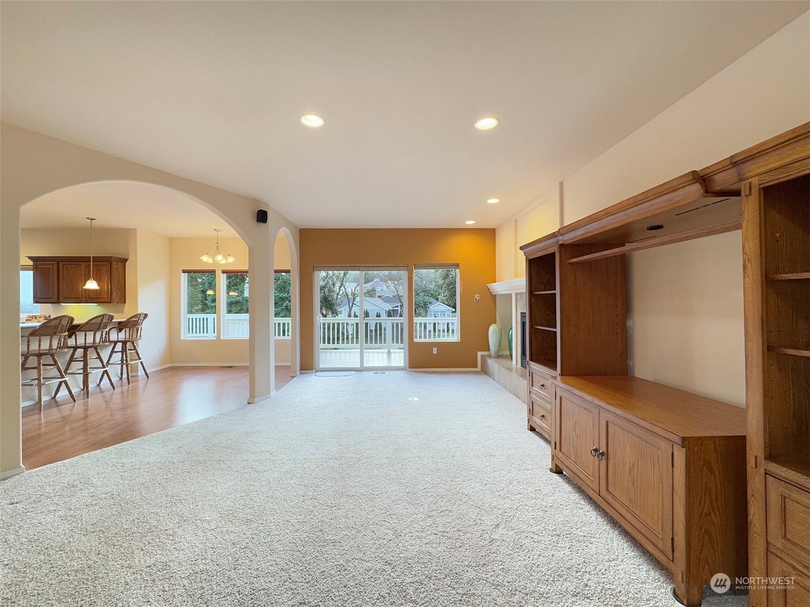 201 Brigadoon Boulevard Sequim, WA 98382 - Photo 18 of 35 a view of a living room and balcony with furniture