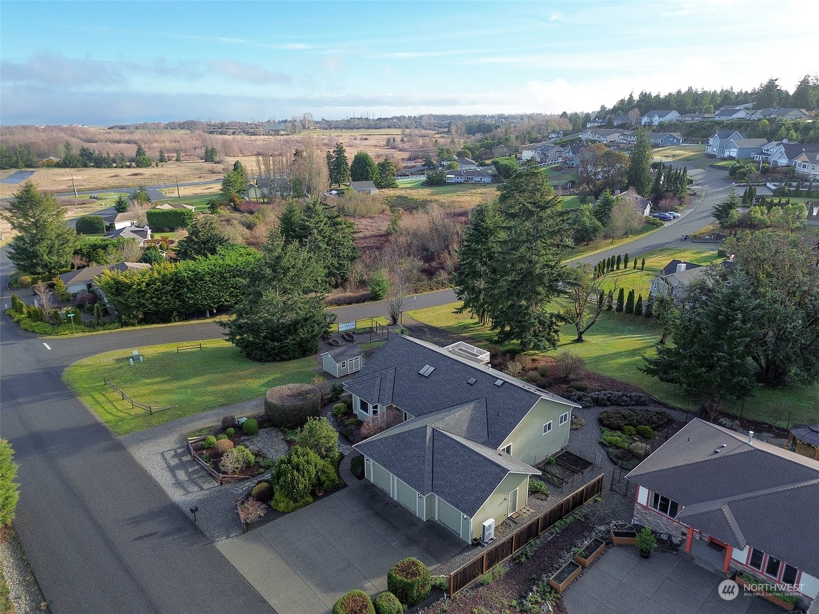 201 Brigadoon Boulevard Sequim, WA 98382 - Photo 2 of 35 an aerial view of a house with outdoor space and street view