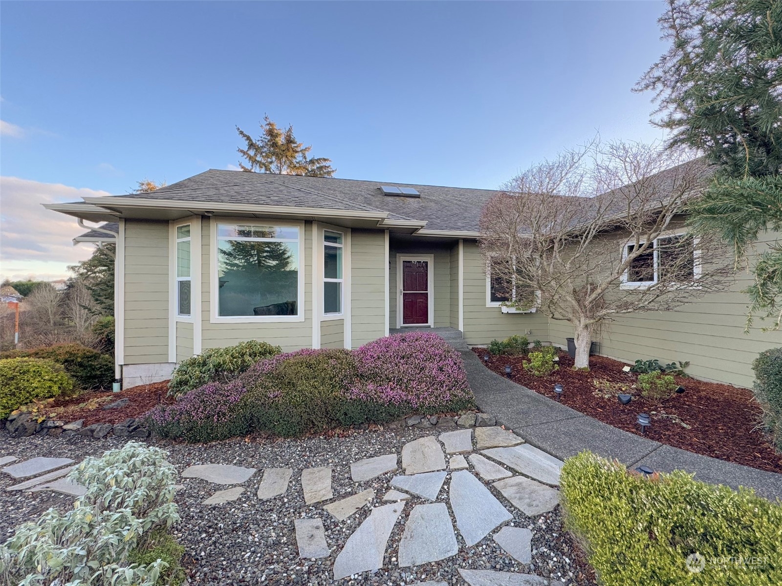 201 Brigadoon Boulevard Sequim, WA 98382 - Photo 4 of 35 a front view of a house with a yard