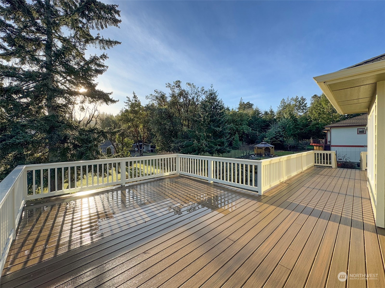 201 Brigadoon Boulevard Sequim, WA 98382 - Photo 9 of 35 a view of balcony with wooden floor and fence