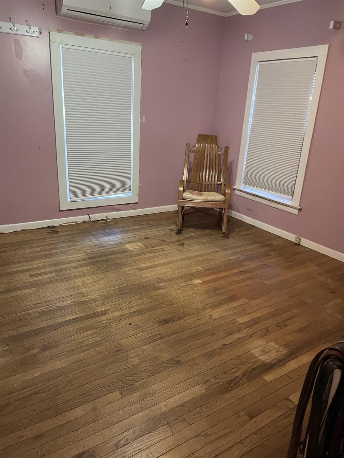 190 South Country Road Remsenburg, NY 11960 - Photo 15 of 20 a view of an empty room with wooden floor