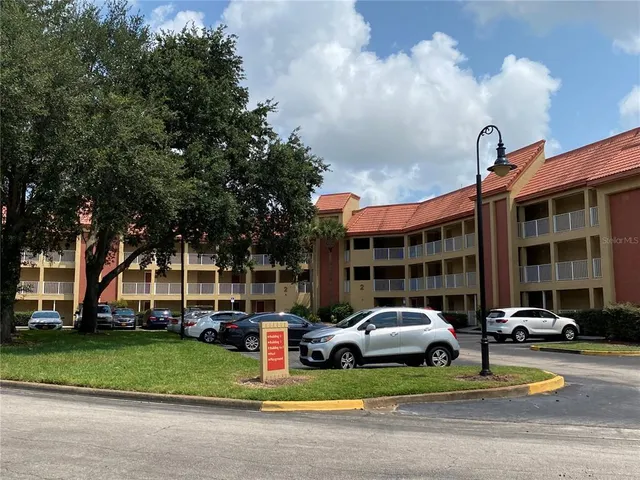 a car parked in front of a house