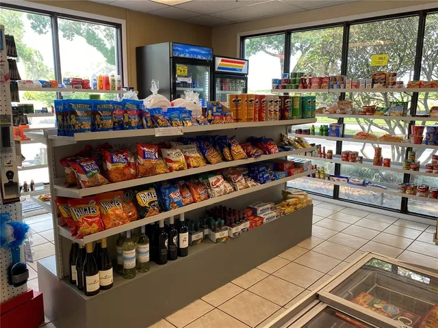 a room with lots of different kinds of flowers
