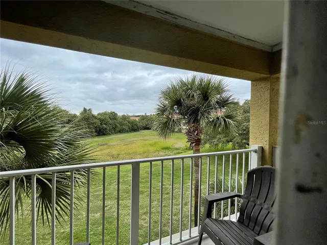 a view of a balcony with lake view