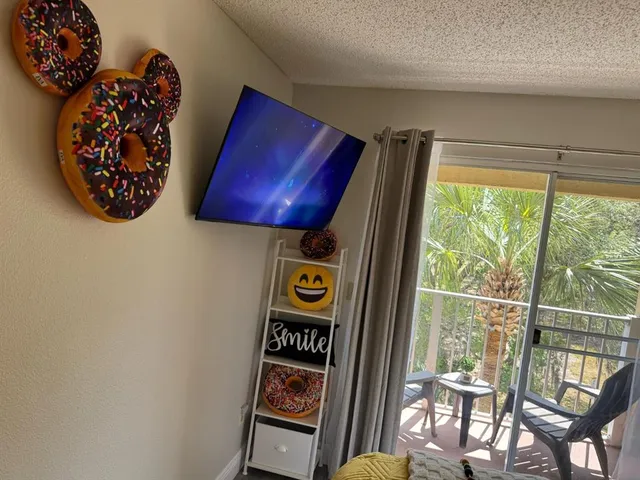 a table with chairs and a window