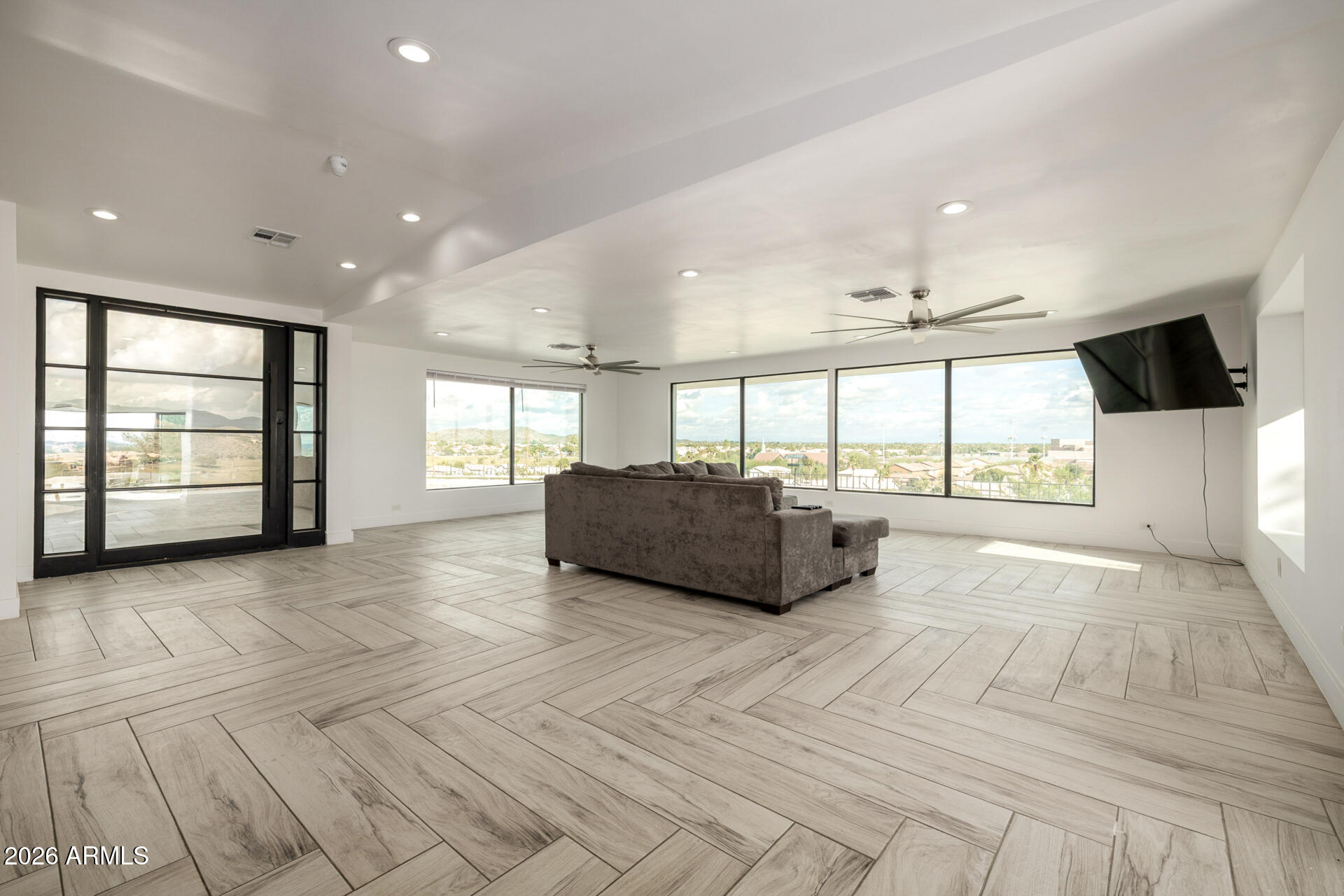 2809 East Frye Road Phoenix, AZ 85048 - Photo 13 of 47 a spacious bedroom with a large bed and a large window
