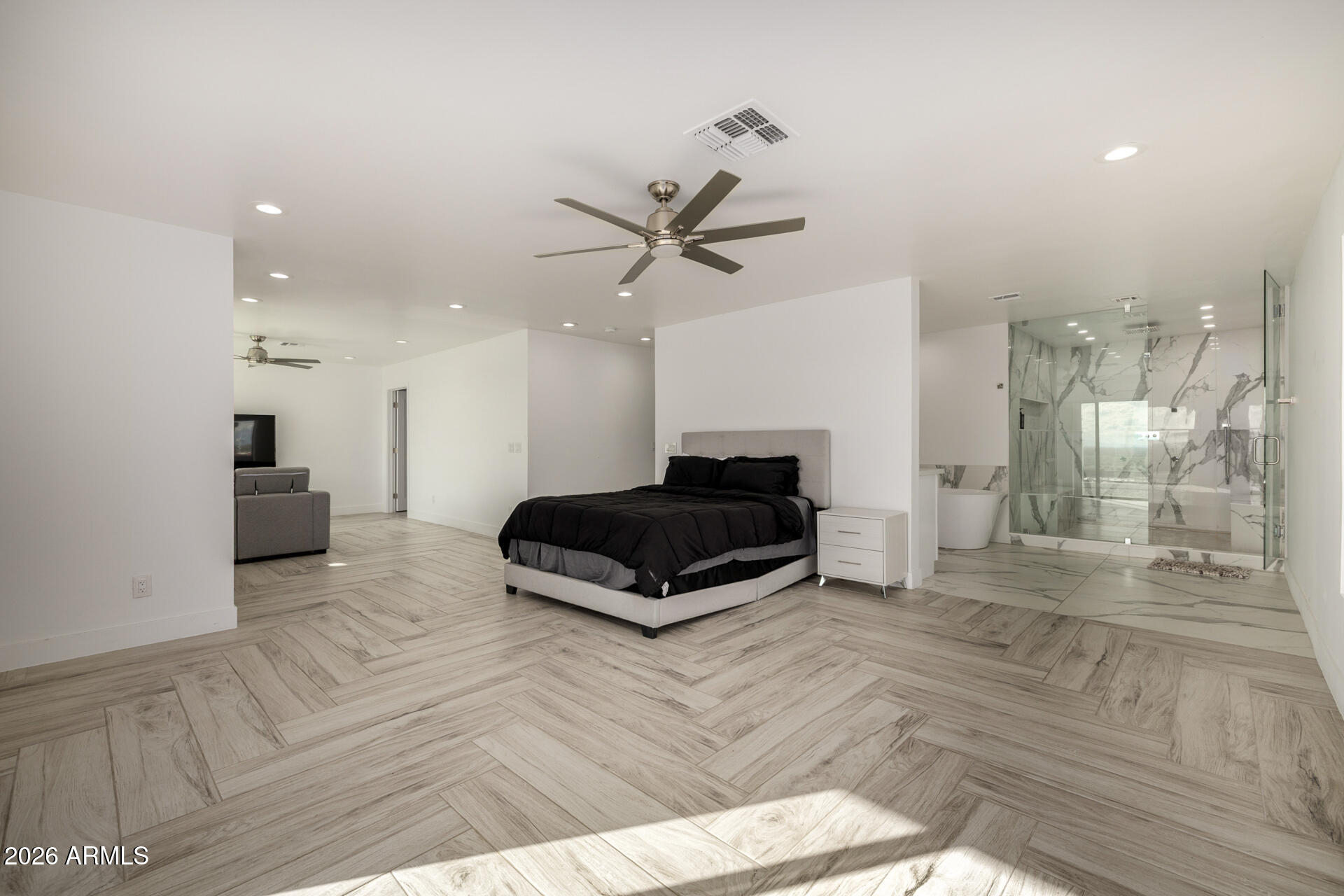 2809 East Frye Road Phoenix, AZ 85048 - Photo 30 of 47 a living room with furniture and a ceiling fan