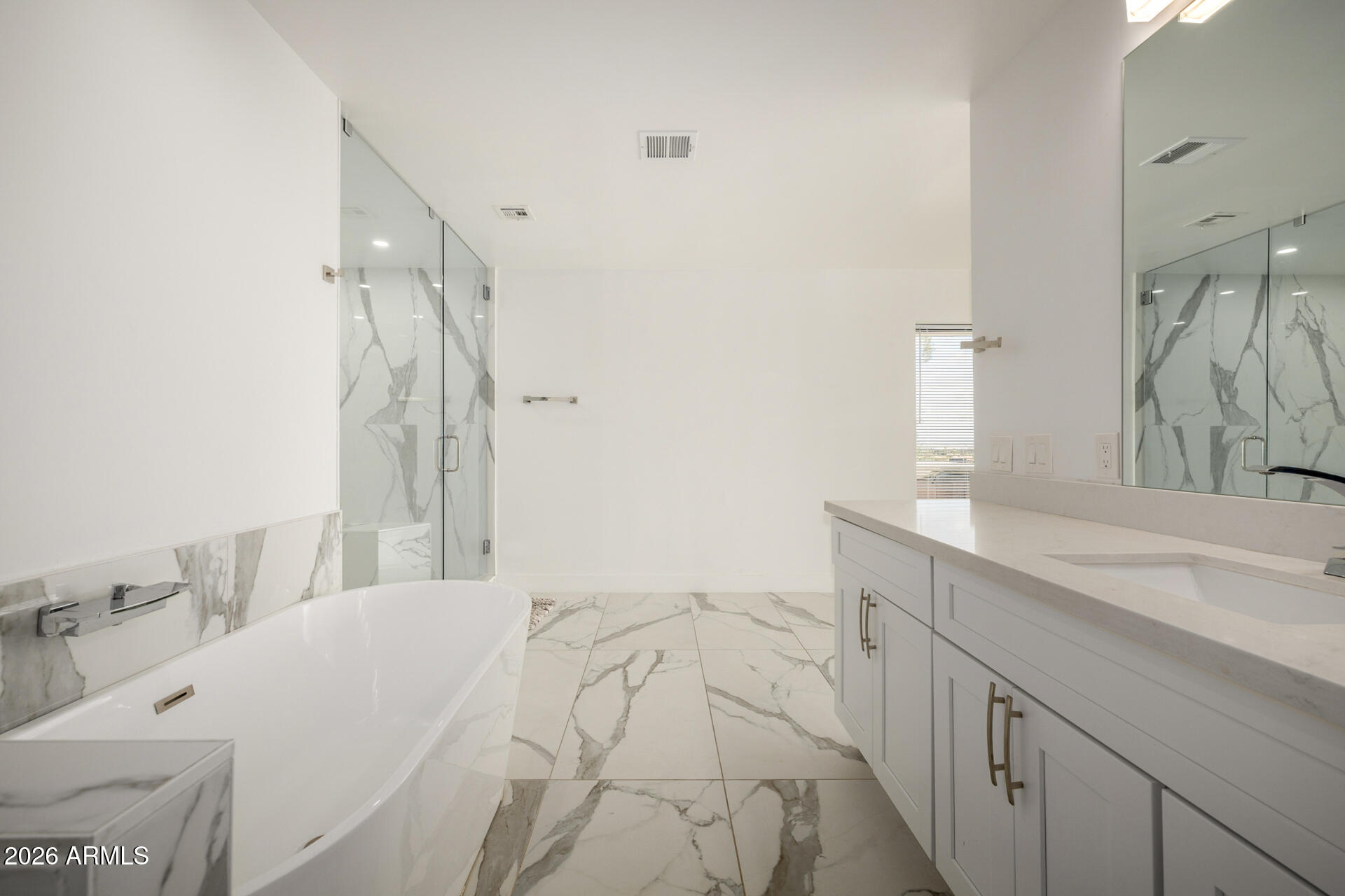 2809 East Frye Road Phoenix, AZ 85048 - Photo 34 of 47 a spacious bathroom with a double vanity sink mirror and shower