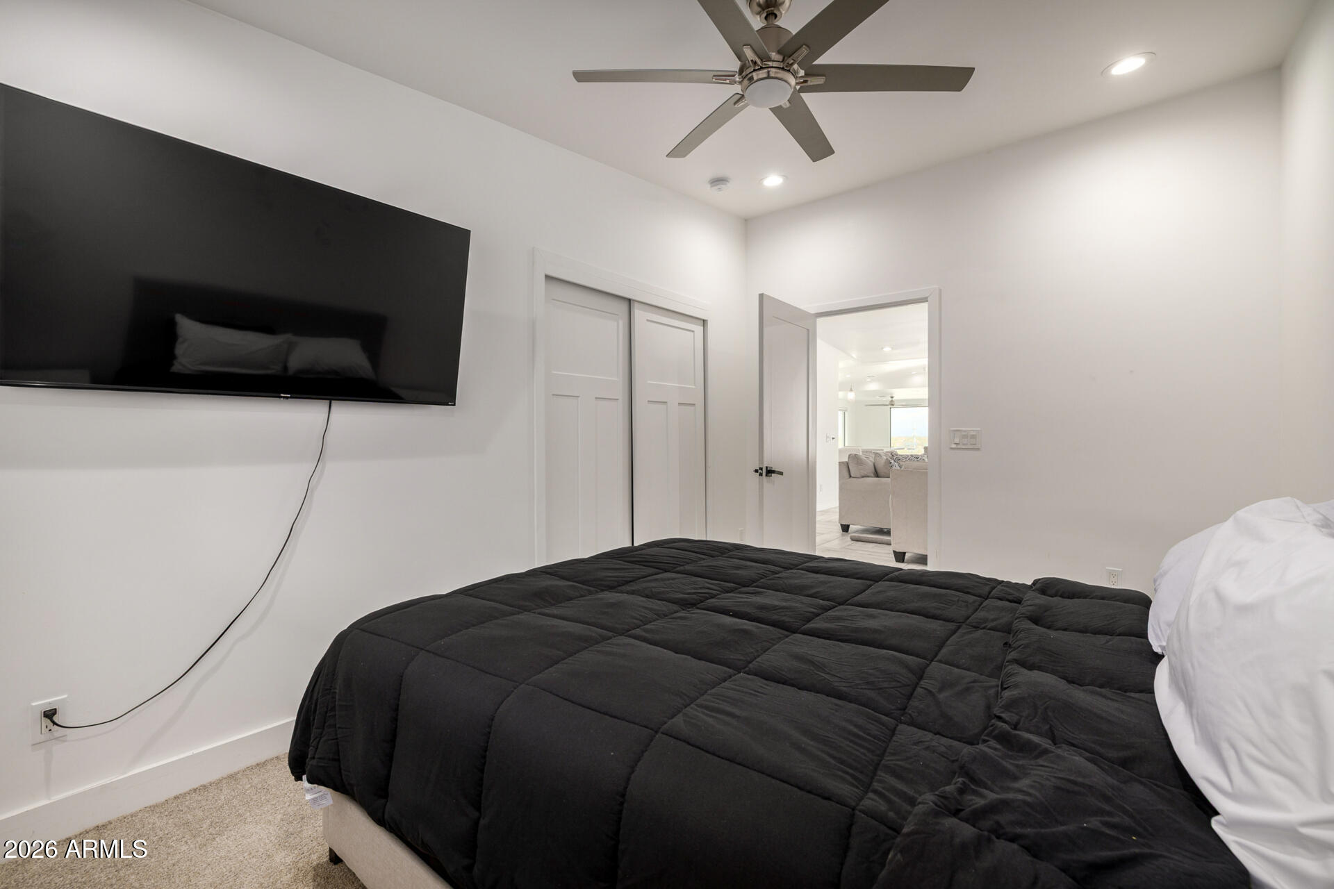 2809 East Frye Road Phoenix, AZ 85048 - Photo 42 of 47 a bedroom with a bed and a flat screen tv