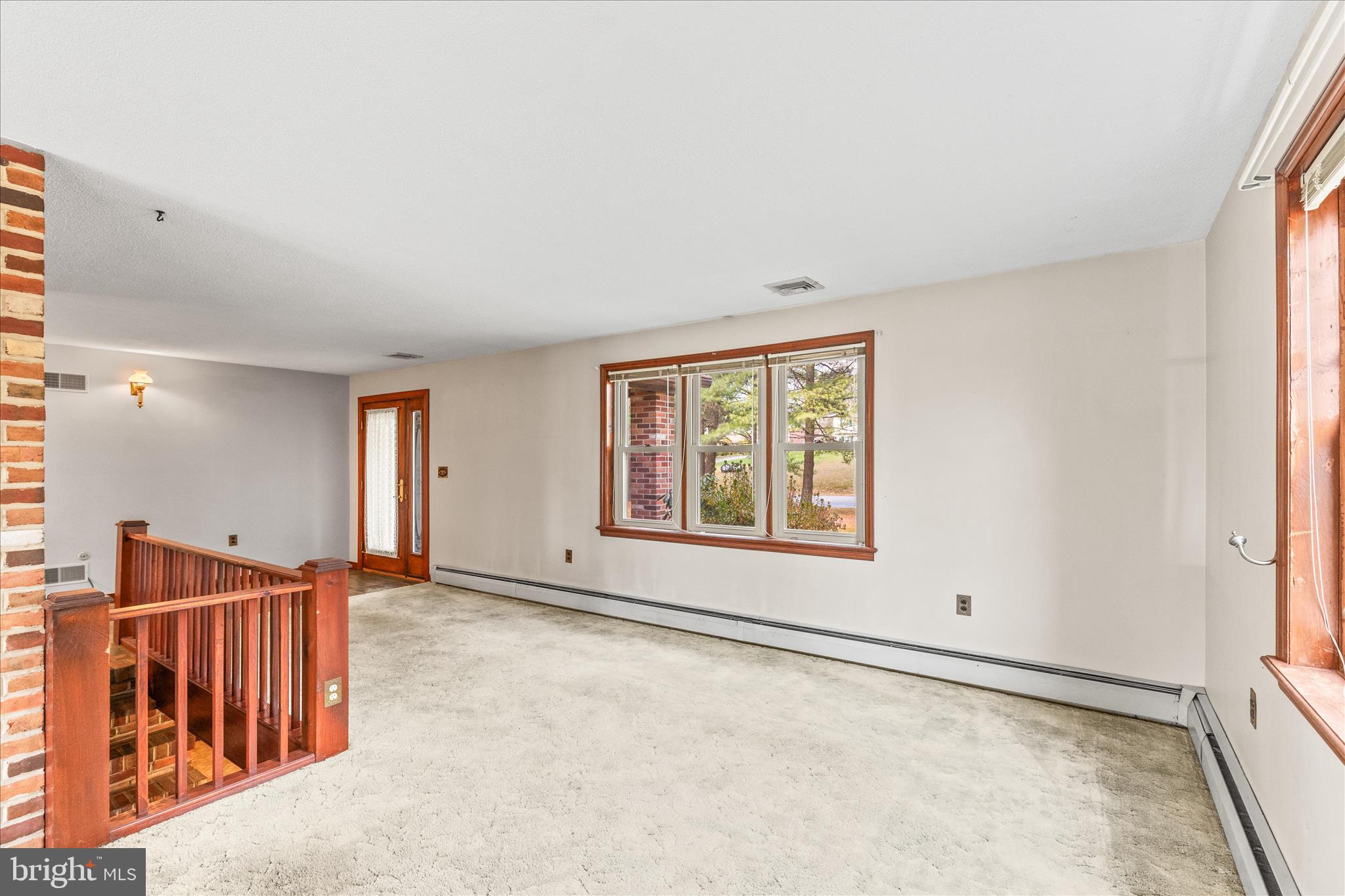 521 Windy Hill Road New Freedom, PA 17349 - Photo 16 of 66 an empty room with windows