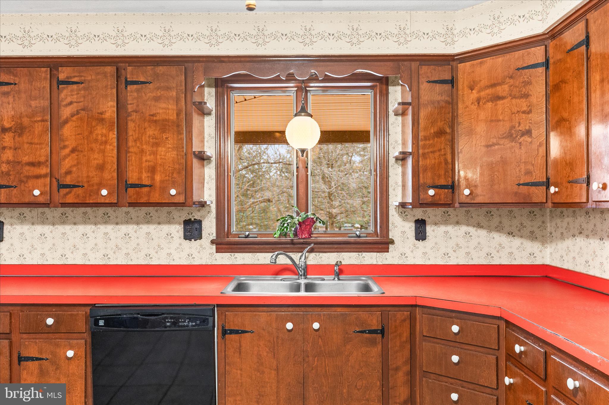 521 Windy Hill Road New Freedom, PA 17349 - Photo 24 of 66 a kitchen with a sink and a window