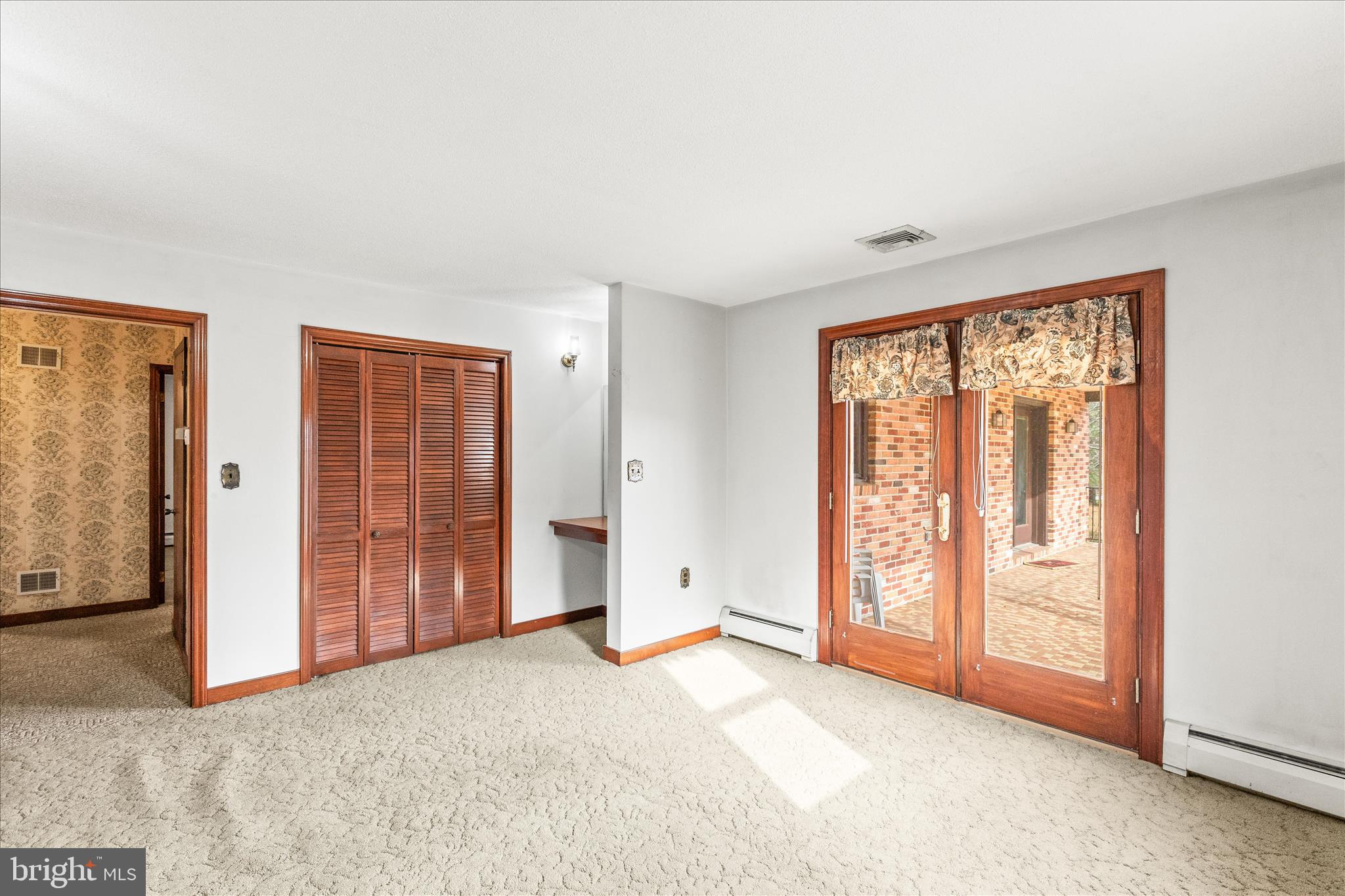 521 Windy Hill Road New Freedom, PA 17349 - Photo 26 of 66 an empty room with windows and closet