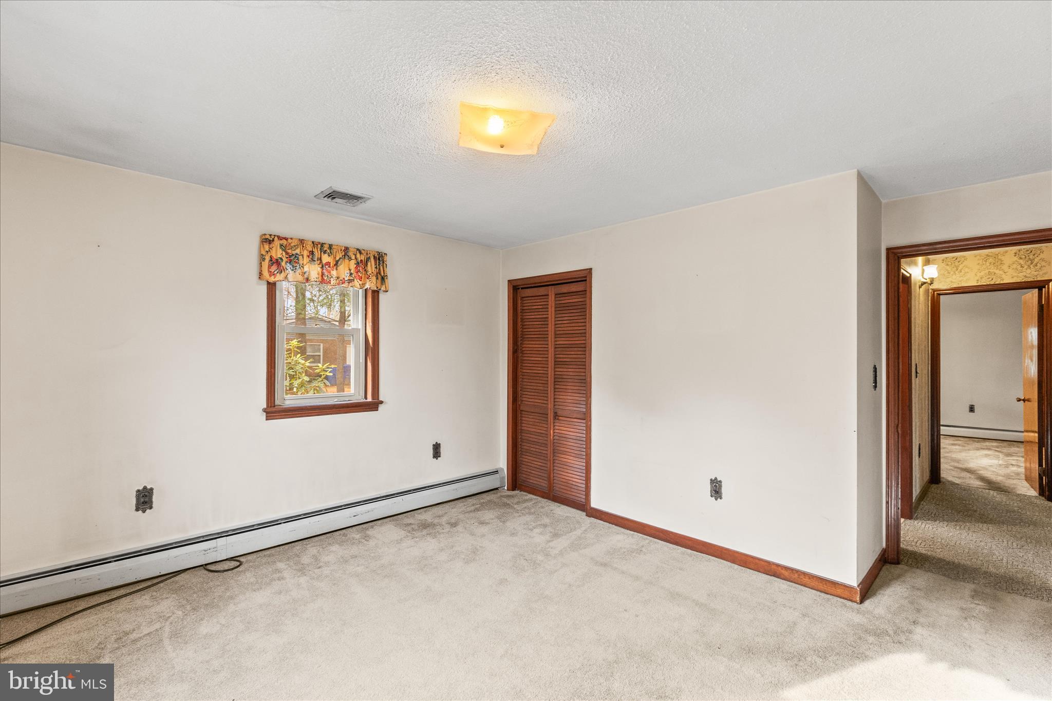 521 Windy Hill Road New Freedom, PA 17349 - Photo 29 of 66 an empty room with windows and closet