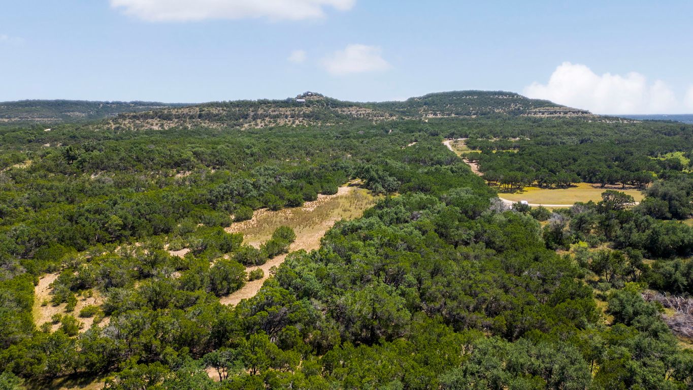 0 Peyton Colony Road Blanco, TX 78606 - Photo 6 of 8 a view of a city with mountains in the background