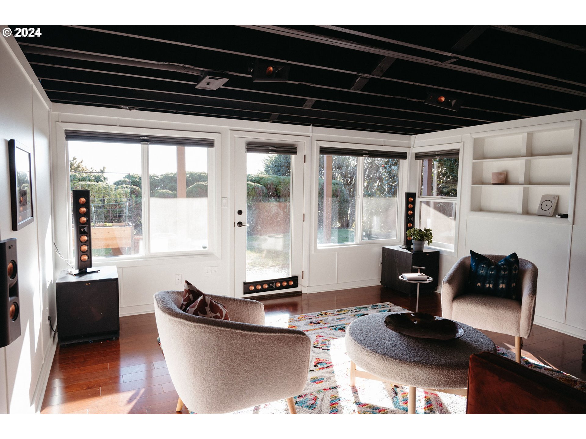 811 Northwest Skyline Crest Road Portland, OR 97229 - Photo 20 of 45 a living room with furniture and large windows