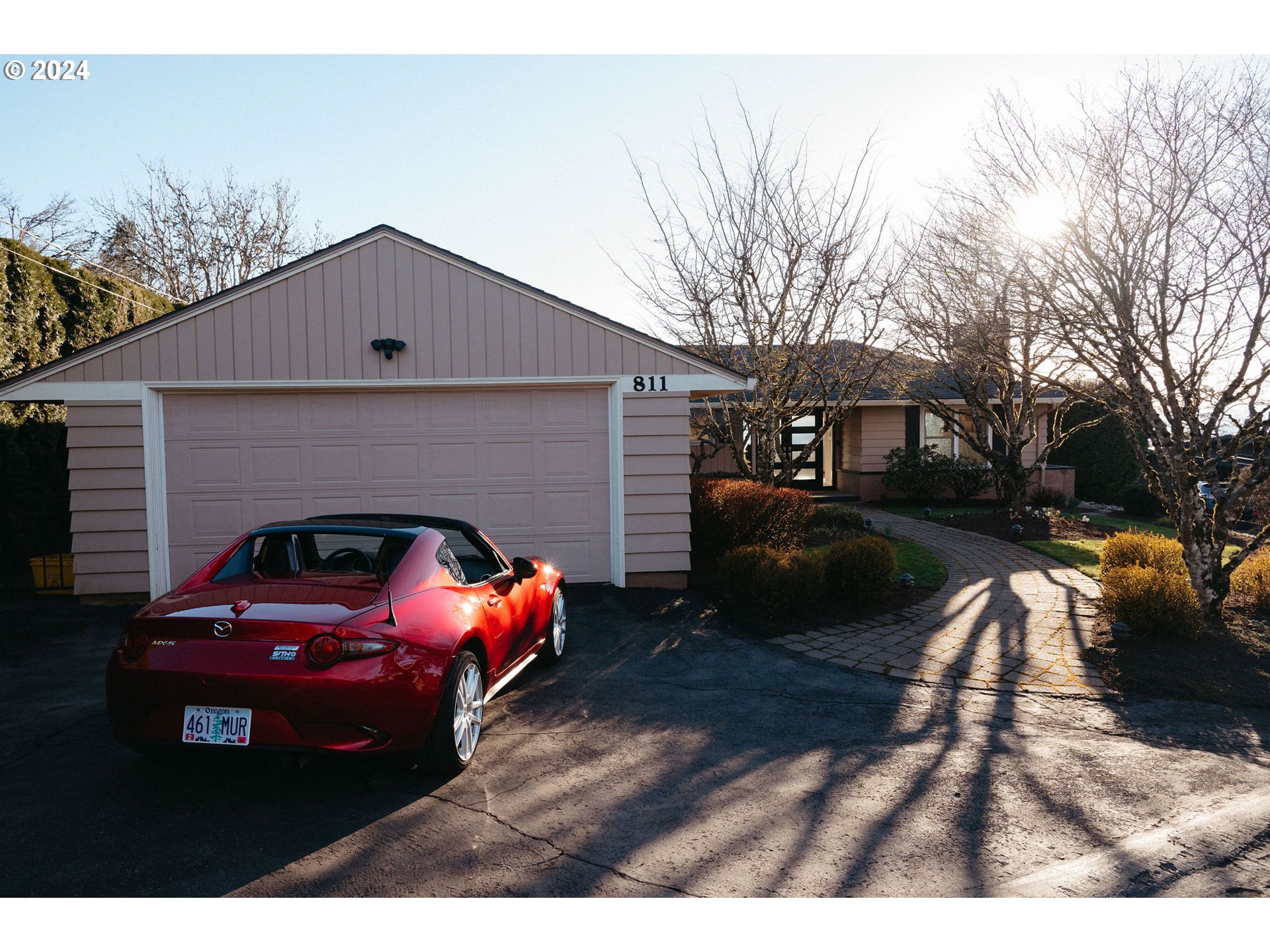811 Northwest Skyline Crest Road Portland, OR 97229 - Photo 31 of 45 a view of house with car parked