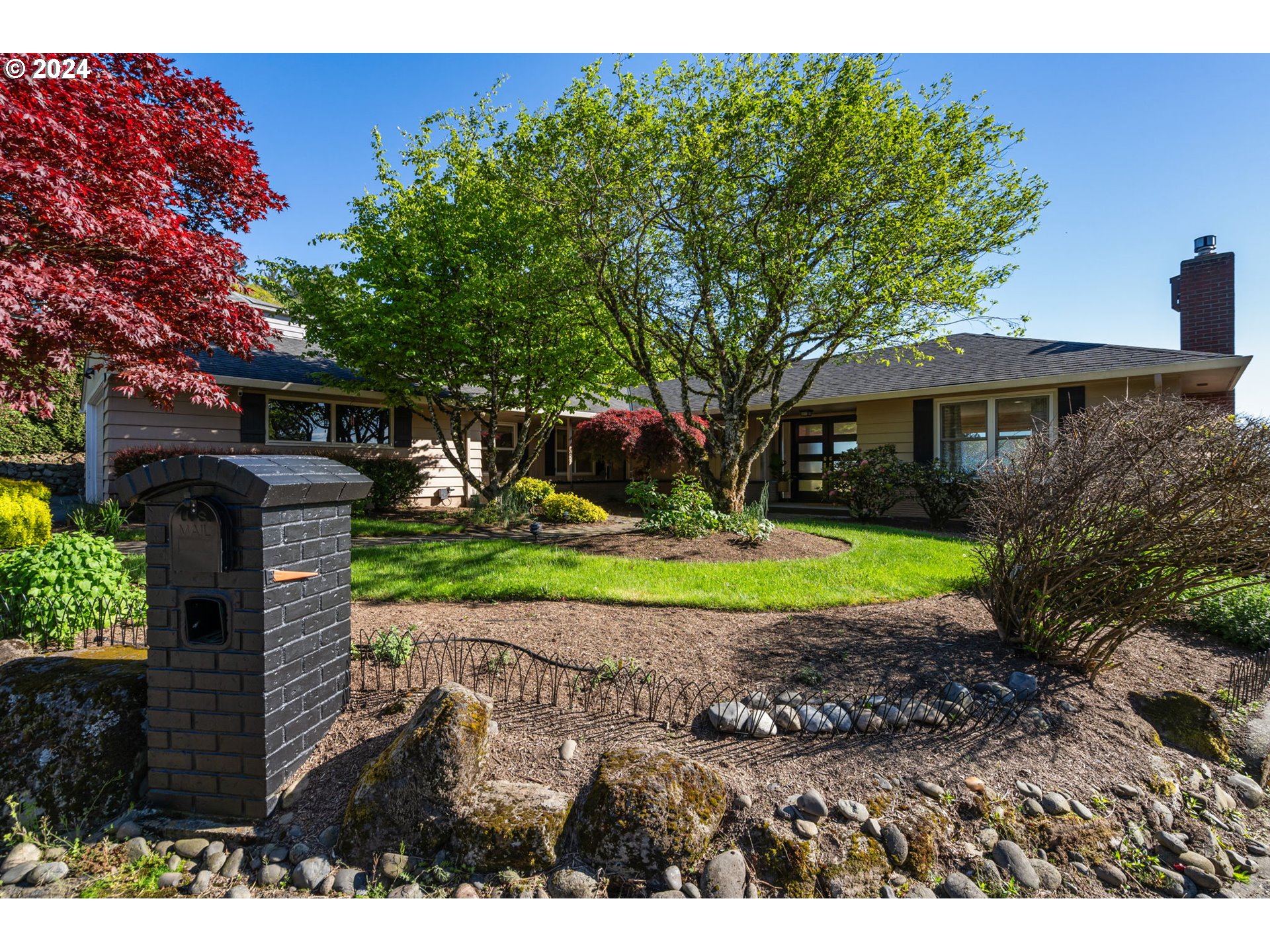 811 Northwest Skyline Crest Road Portland, OR 97229 - Photo 44 of 45 a view of a house with a yard