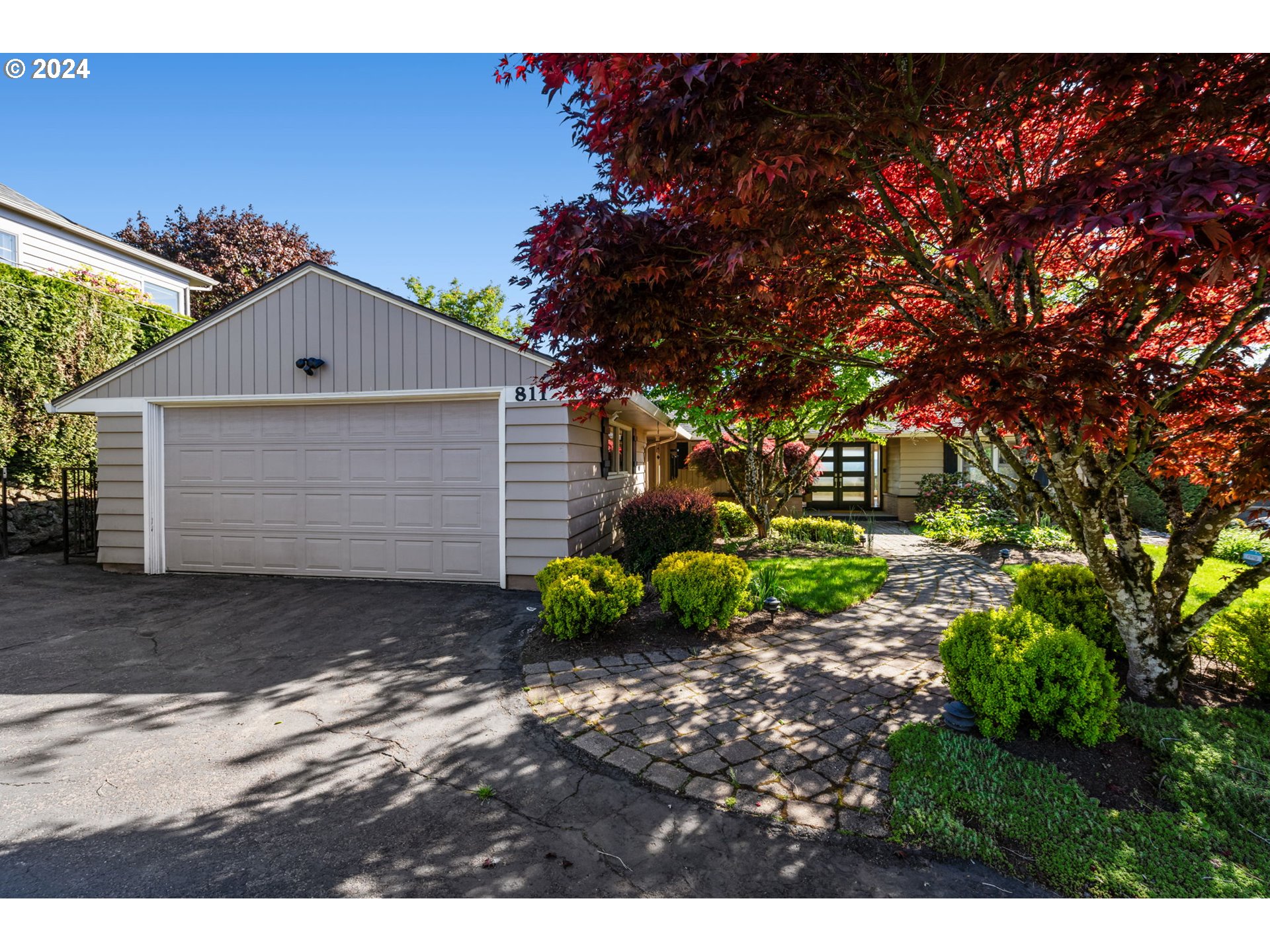 811 Northwest Skyline Crest Road Portland, OR 97229 - Photo 45 of 45 a front view of a house with a yard