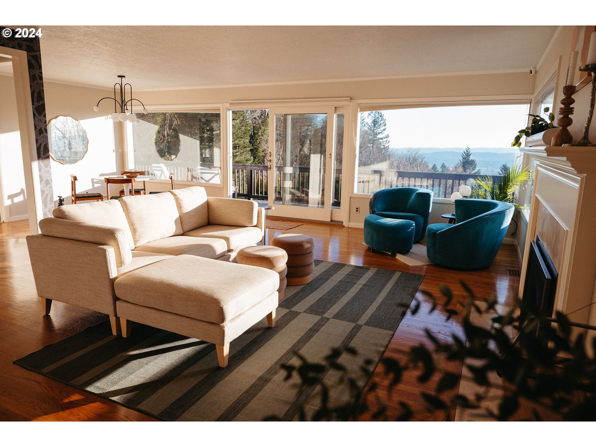 811 Northwest Skyline Crest Road Portland, OR 97229 - Photo 6 of 45 a living room with furniture and a large window