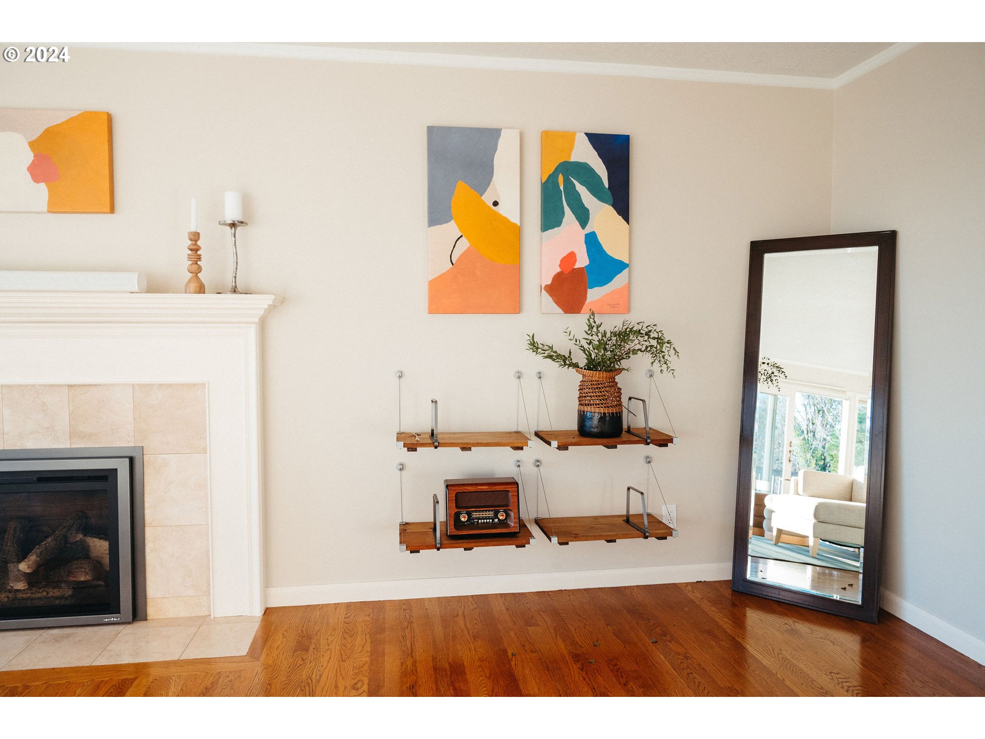 811 Northwest Skyline Crest Road Portland, OR 97229 - Photo 7 of 45 a living room with furniture and a fireplace