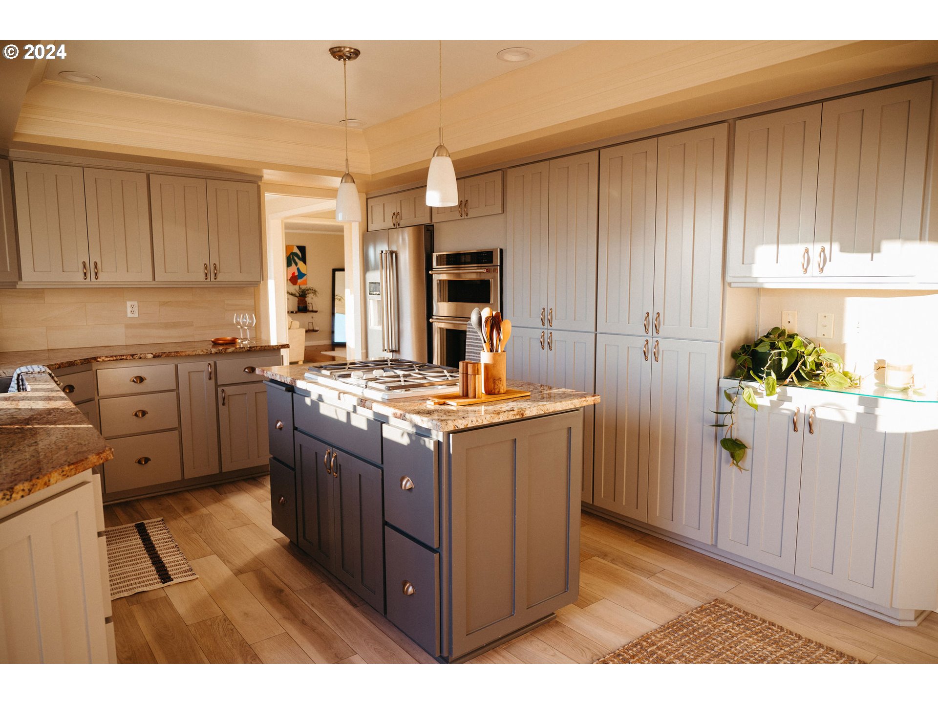 811 Northwest Skyline Crest Road Portland, OR 97229 - Photo 10 of 45 a kitchen with a stove window and cabinets