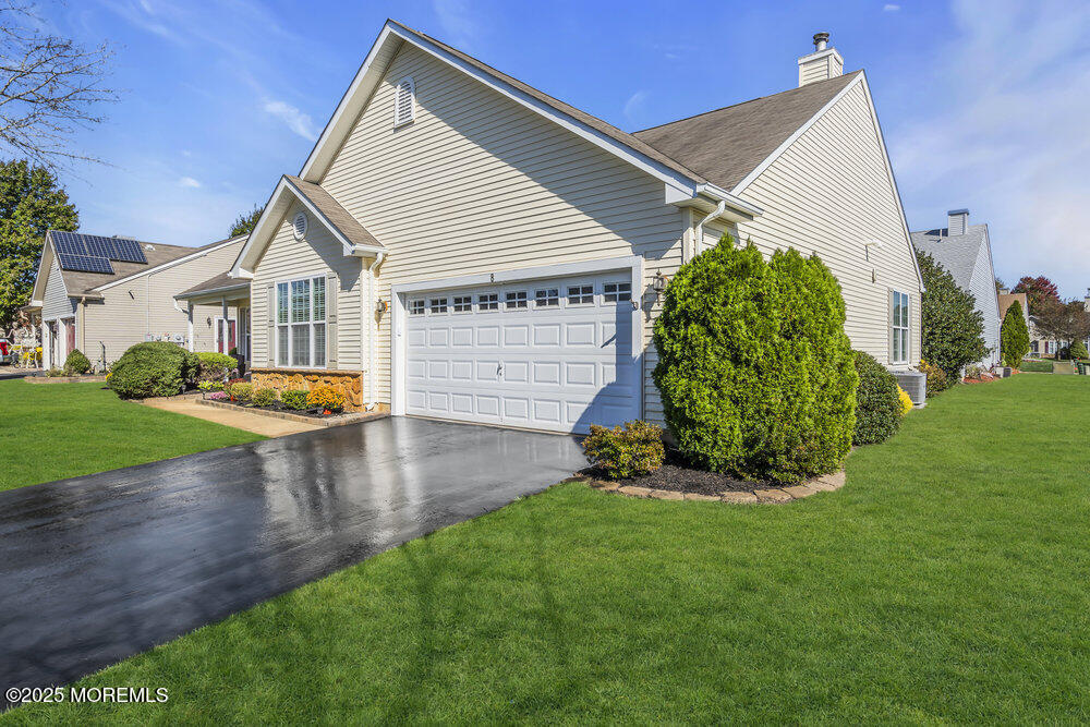 8 Rosedale Lane Whiting, NJ 08759 - Photo 5 of 36 a front view of a house with a yard