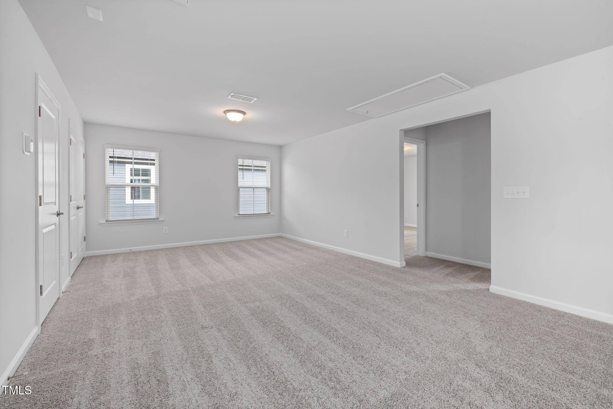 1385 Rowboat Road Apex, NC 27502 - Photo 10 of 22 a view of an empty room with a window