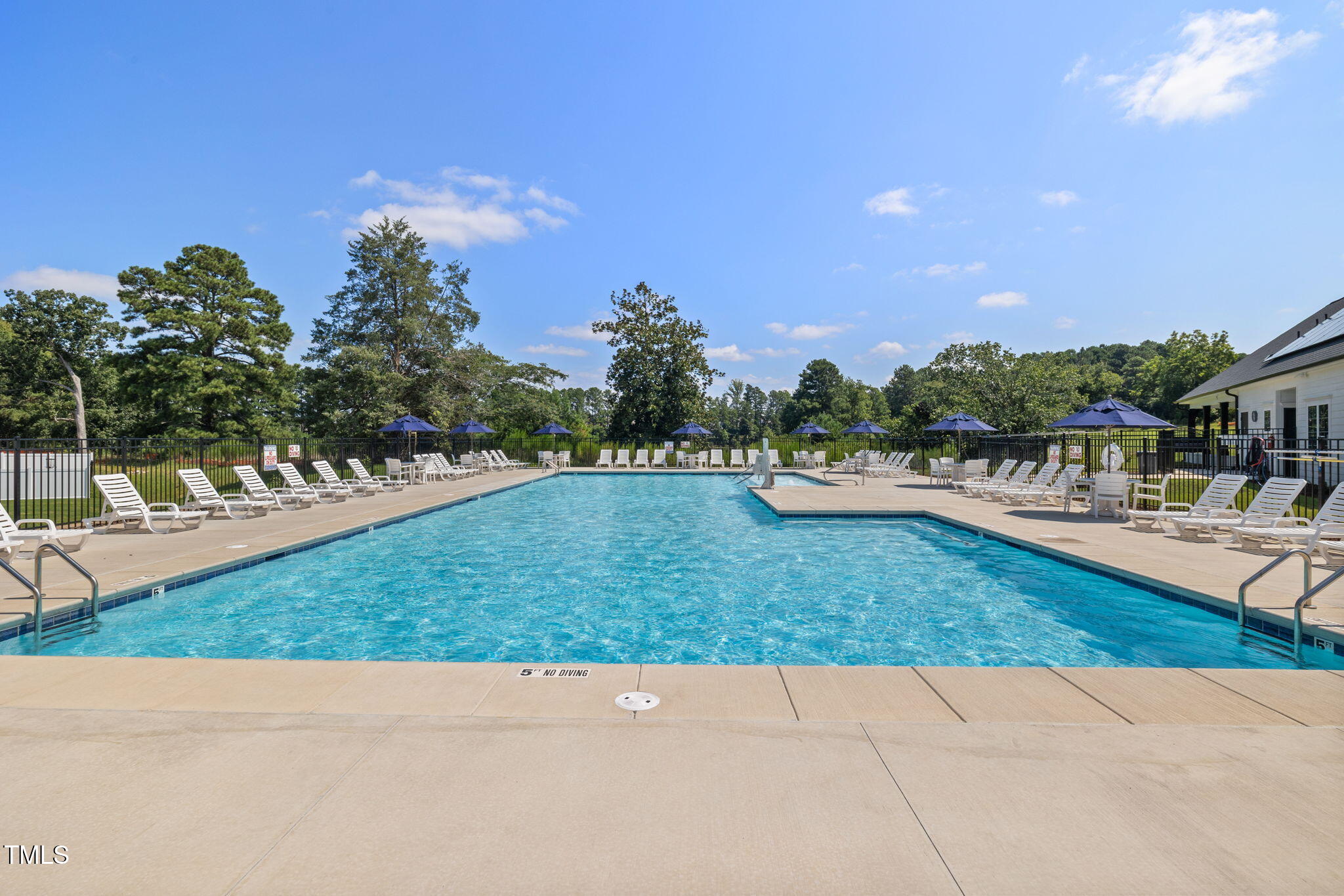 1385 Rowboat Road Apex, NC 27502 - Photo 16 of 22 a view of swimming pool and outdoor seating