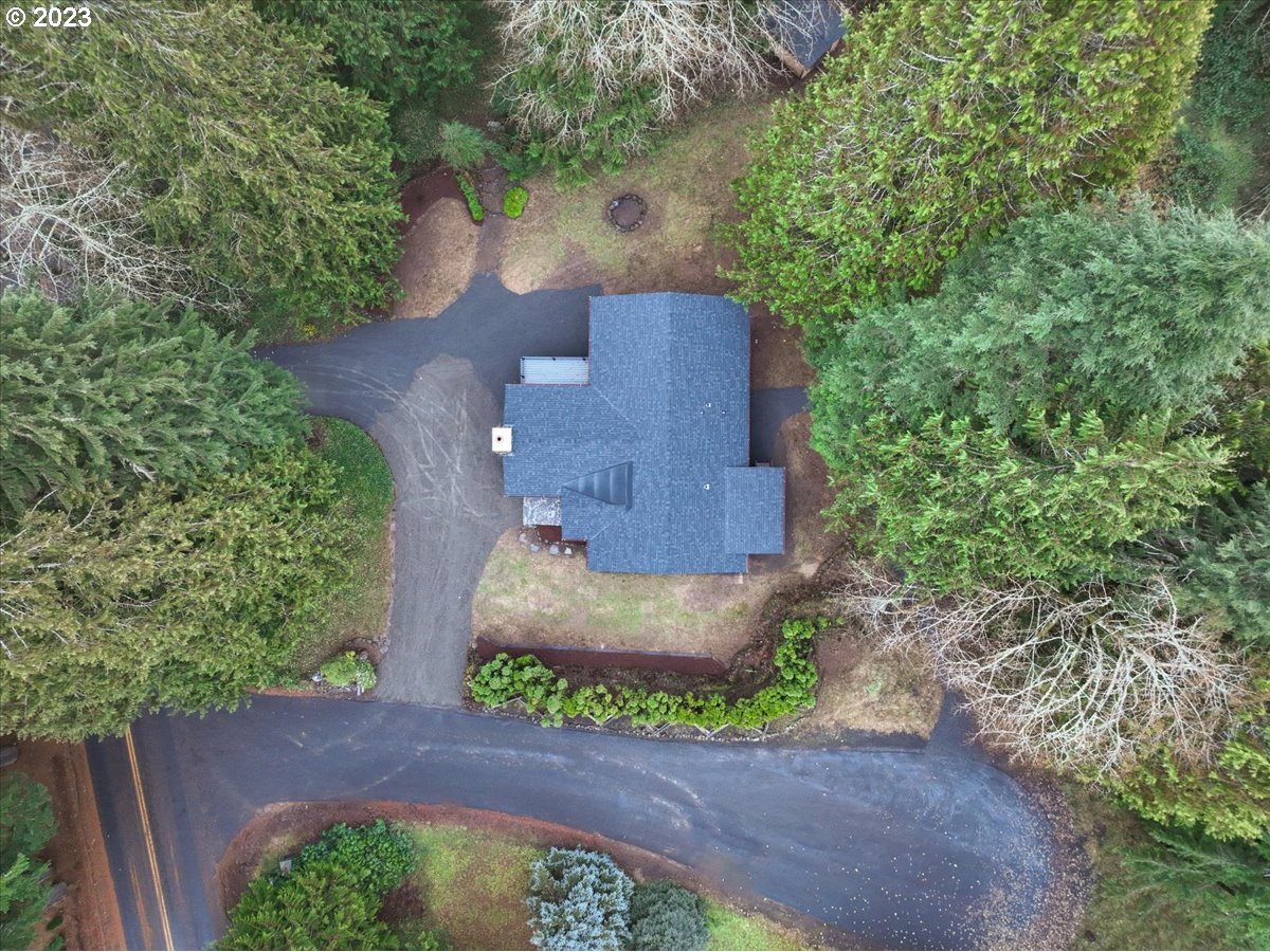 101 Shelley Road Longview, WA 98632 - Photo 4 of 33 an aerial view of a house with a yard and large tree