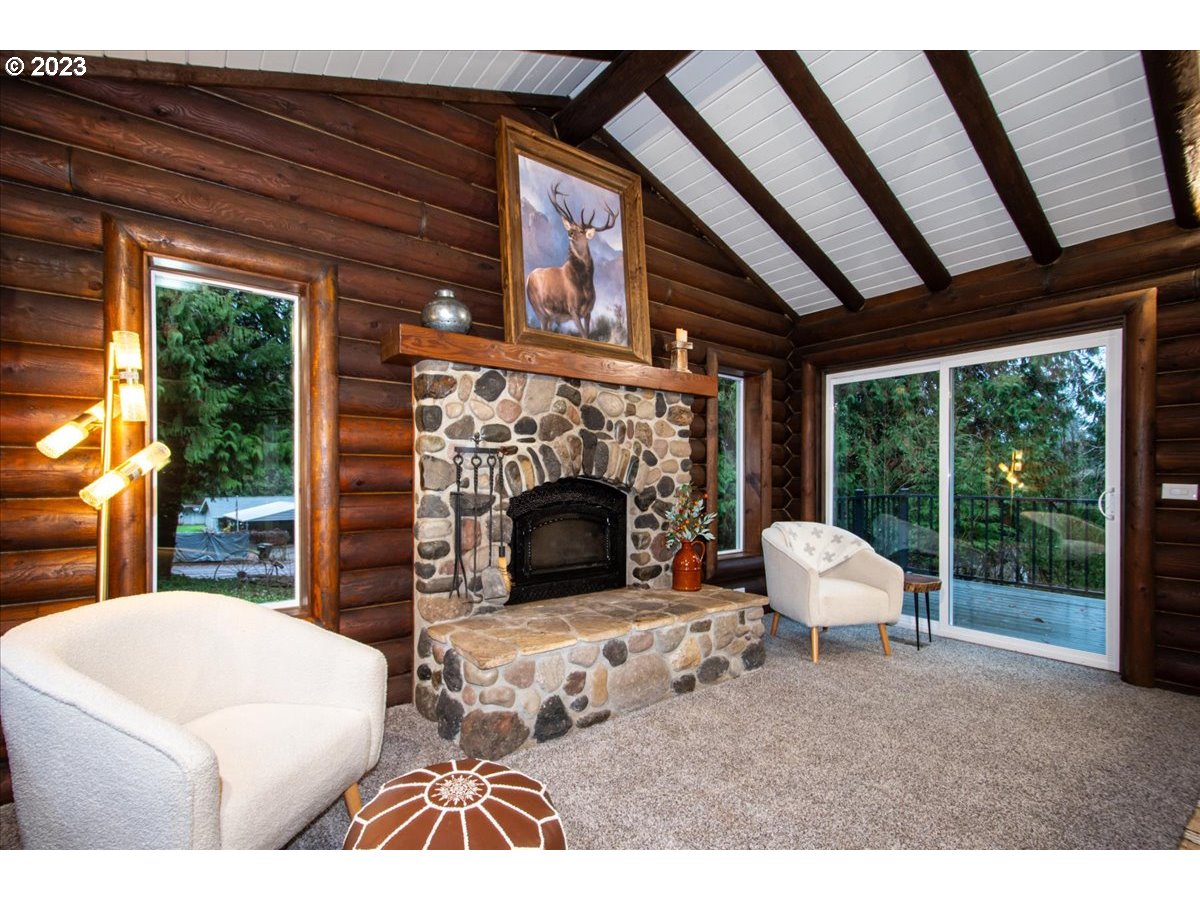 101 Shelley Road Longview, WA 98632 - Photo 8 of 33 a bed room with a bed and a fireplace