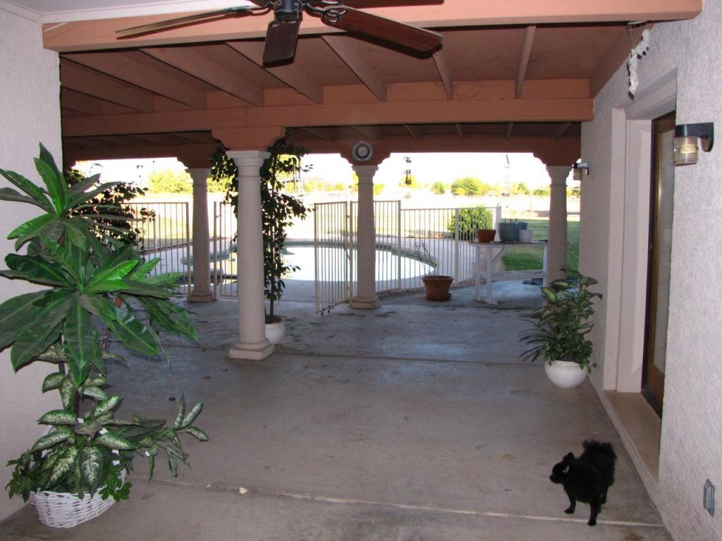 7815 North Perryville Road Waddell, AZ 85355 - Photo 4 of 11 Covered Patio