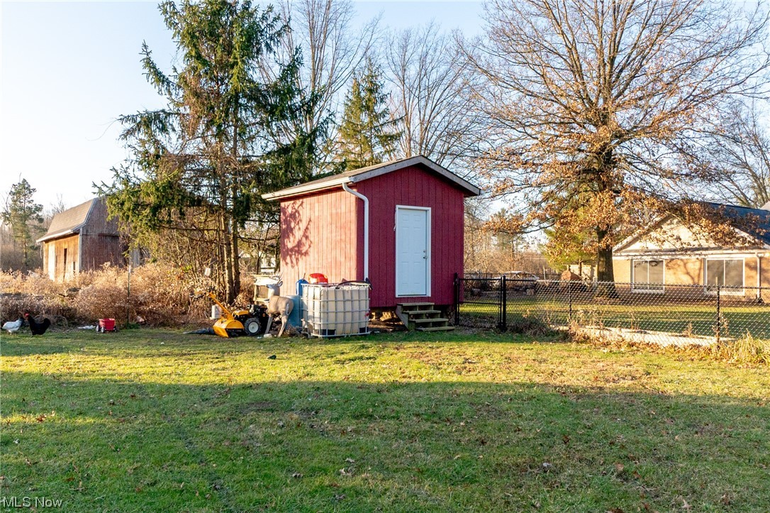 4529 Beat Road Litchfield, OH 44253 - Photo 34 of 42 View of shed / structure with a lawn