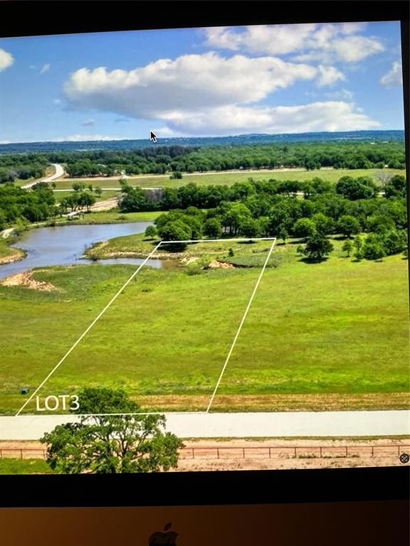 1078 Cornerstone Road Poolville, TX 76487 - Photo 1 of 7 a view of an ocean and beach