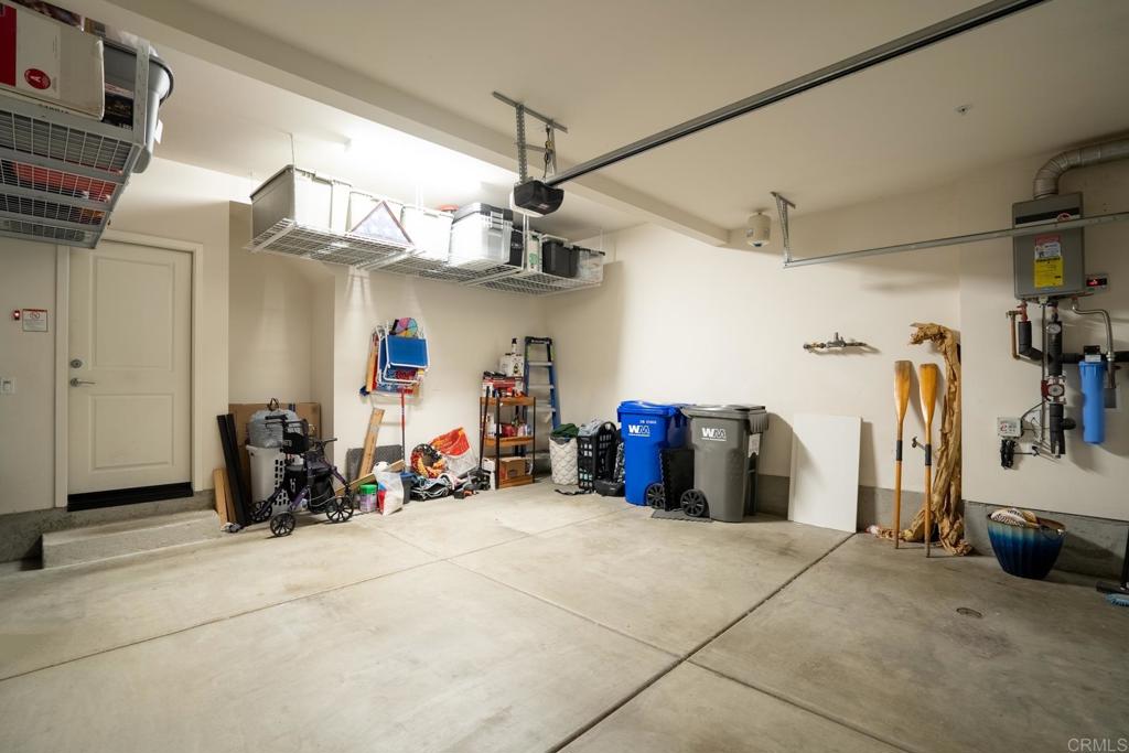 4315 Star Path Way, Unit 4 Oceanside, CA 92056 - Photo 34 of 40 a view of a storage room with a lot of stuff