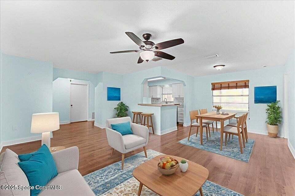1527 Spruce Road Melbourne, FL 32935 - Photo 22 of 24 living kitchen eat in staged