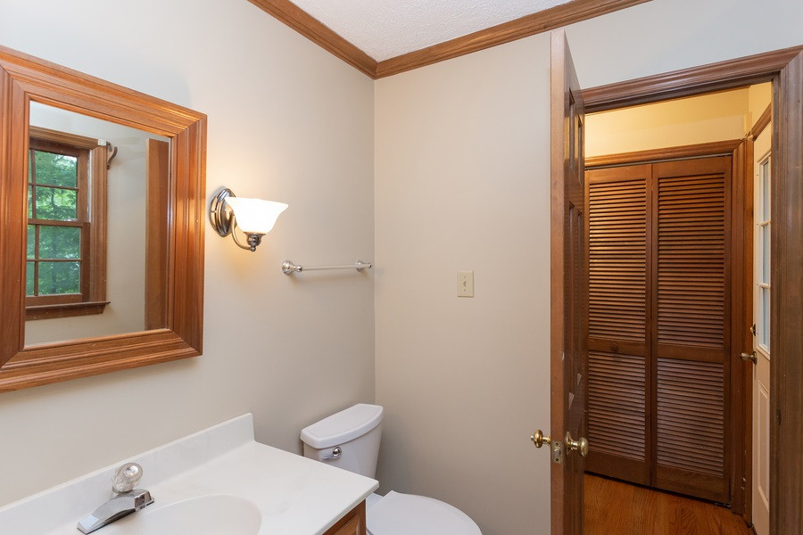 6917 Sandringham Drive Raleigh, NC 27613 - Photo 9 of 25 Conveniently located downstairs 1/2 bath! Half Bath