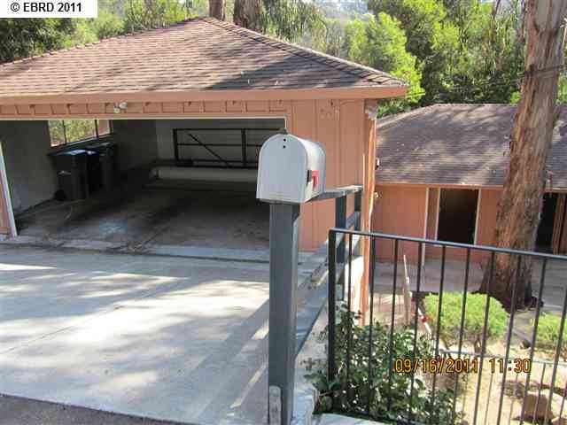 a view of backyard with seating space