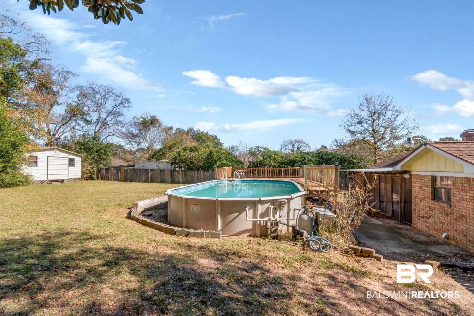 8304 Champlain Circle Mobile, AL 36695 - Photo 33 of 46 View of pool with a shed and a lawn