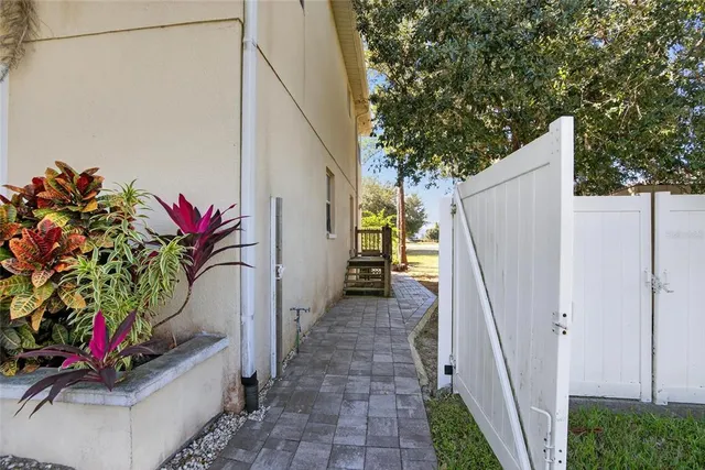 a view of a entryway with flower pots